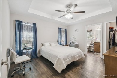 Tucked away on a VERY INTIMATE and ISOLATED.55-acre corner lot