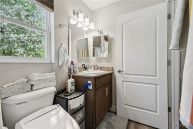 Tucked away on a VERY INTIMATE and ISOLATED.55-acre corner lot