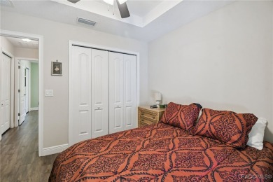 Tucked away on a VERY INTIMATE and ISOLATED.55-acre corner lot