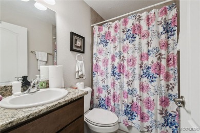 Tucked away on a VERY INTIMATE and ISOLATED.55-acre corner lot