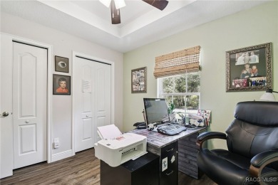 Tucked away on a VERY INTIMATE and ISOLATED.55-acre corner lot