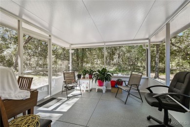 Tucked away on a VERY INTIMATE and ISOLATED.55-acre corner lot