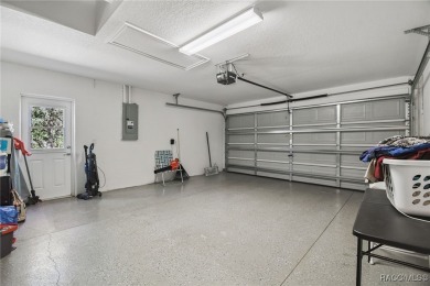 Tucked away on a VERY INTIMATE and ISOLATED.55-acre corner lot