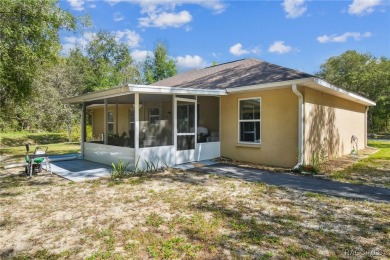 Tucked away on a VERY INTIMATE and ISOLATED.55-acre corner lot