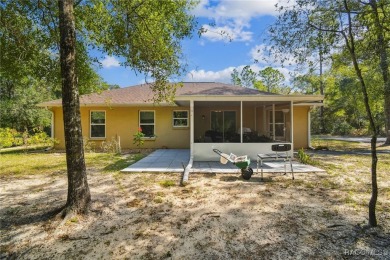 Tucked away on a VERY INTIMATE and ISOLATED.55-acre corner lot