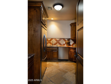 This magnificent home rest on nearly 2 extremely private acres