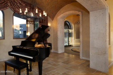 This magnificent home rest on nearly 2 extremely private acres