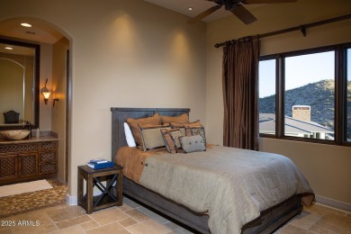 This magnificent home rest on nearly 2 extremely private acres