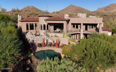 This magnificent home rest on nearly 2 extremely private acres