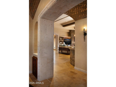 This magnificent home rest on nearly 2 extremely private acres