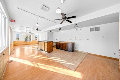 This real estate property comprises a three-unit building