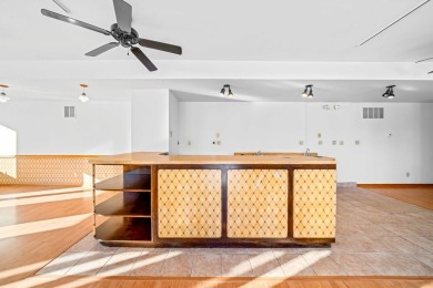 This real estate property comprises a three-unit building