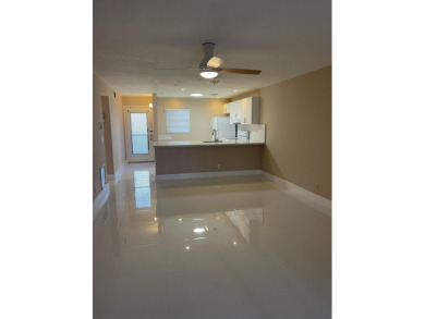 Bright and open, ready to move in two bedrooms-two baths condo