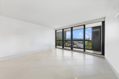 Experience the epitome of coastal luxury in this beautifully