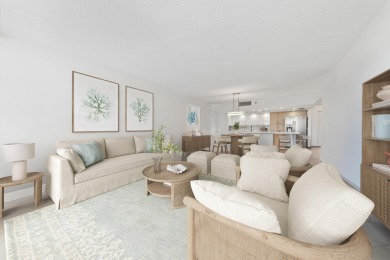 Experience the epitome of coastal luxury in this beautifully