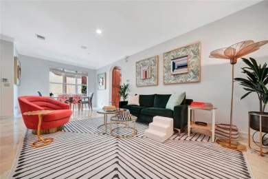 Experience the epitome of urban luxury in this 3-level townhome