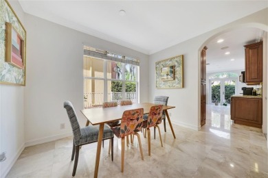 Experience the epitome of urban luxury in this 3-level townhome