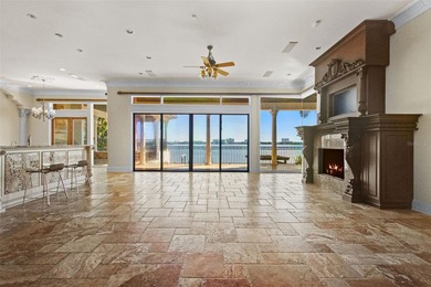 Experience this sleek, modernized Mediterranean masterpiece in