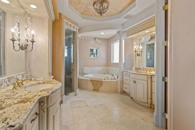 Experience this sleek, modernized Mediterranean masterpiece in