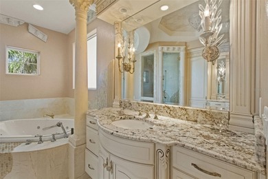 Experience this sleek, modernized Mediterranean masterpiece in