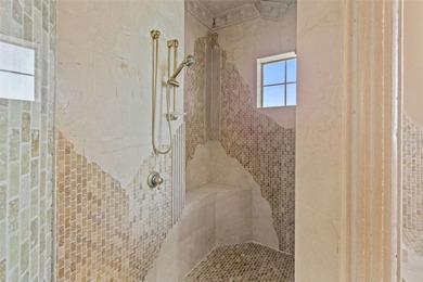 Experience this sleek, modernized Mediterranean masterpiece in