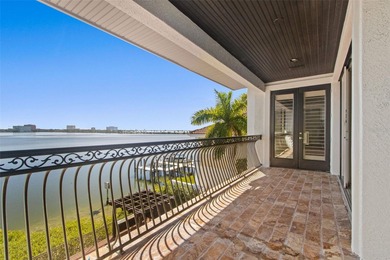 Experience this sleek, modernized Mediterranean masterpiece in