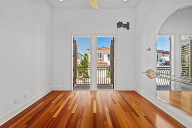 Experience this sleek, modernized Mediterranean masterpiece in