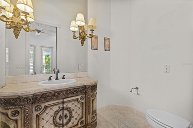 Experience this sleek, modernized Mediterranean masterpiece in