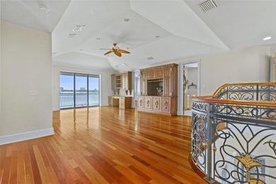 Experience this sleek, modernized Mediterranean masterpiece in