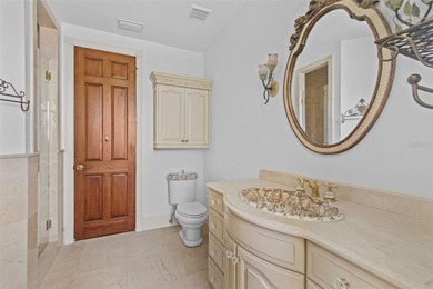 Experience this sleek, modernized Mediterranean masterpiece in