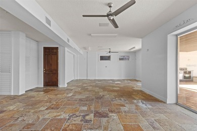 Experience this sleek, modernized Mediterranean masterpiece in