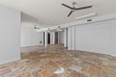 Experience this sleek, modernized Mediterranean masterpiece in