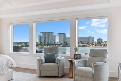 Completed in 2024, this stunning harborfront home offers the