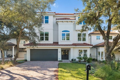 Completed in 2024, this stunning harborfront home offers the