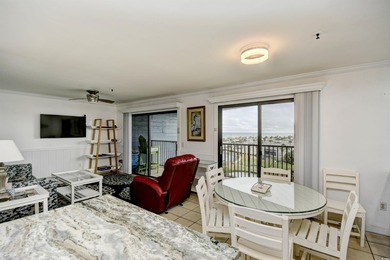 This TOTALLY REMODELED  Turnkey ocean view 2 bedroom unit is a