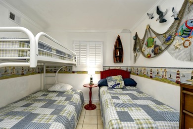 This TOTALLY REMODELED  Turnkey ocean view 2 bedroom unit is a