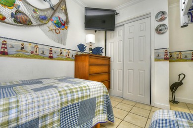 This TOTALLY REMODELED  Turnkey ocean view 2 bedroom unit is a