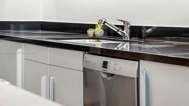 Rare opportunity to own a residence with stunning bay and sunset