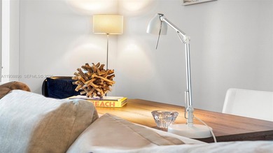 Rare opportunity to own a residence with stunning bay and sunset