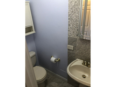 Sunlit top-floor living featuring 2 bedrooms, 1 full bath, and