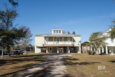 Waterfront custom home with private beach access on a quiet
