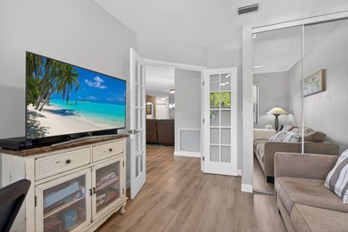 Magnificently renovated 3 bedroom, 2 full bath, 2nd floor condo