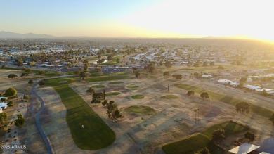 Beautifully updated home on a Golf Course Lot! Wood-look