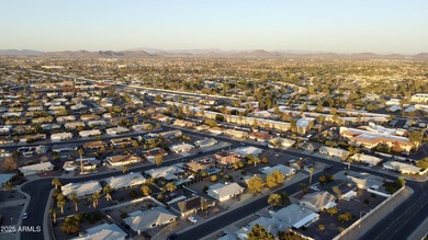 Beautifully updated home on a Golf Course Lot! Wood-look