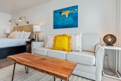 This charming bay facing studio condo, situated in the heart of