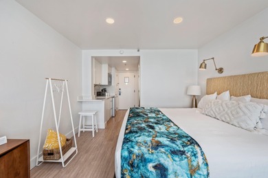 This charming bay facing studio condo, situated in the heart of