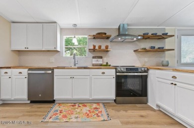 Fully Fenced 1.4-Acre Homestead Retreat with Dual Workshops -