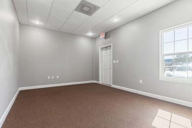 Welcome to Suite C at Diamond Lakes Office Park - a ground-floor