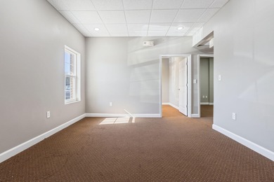 Welcome to Suite C at Diamond Lakes Office Park - a ground-floor