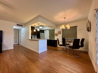 55+ Beautiful Updated First Floor Corner Condo in Kings Point